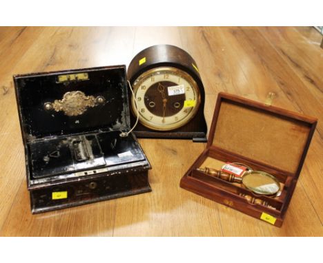 Smiths Enfield mantel clock, lockable cash tin, boxed magnifying glass and letter opener