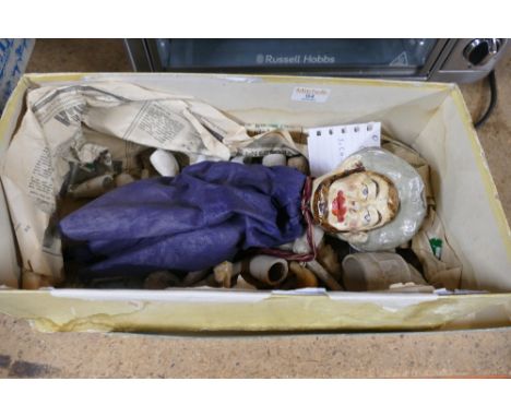 Vintage clay pipes and composite head puppet