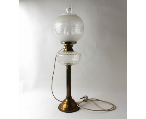 Vintage oil lamp on brass column stand with clear glass reservoir and etched shade converted to electric  