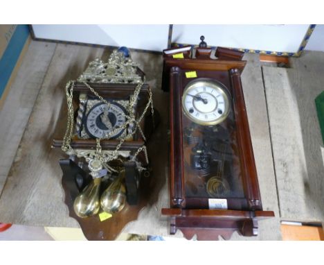 Wooden and brass chain driven wall clock and modern wall clock marked Highlands