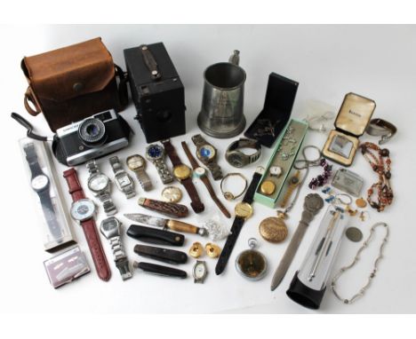 Box of Brownie camera, metal tankard, wristwatches, penknives, Ronson lighter etc.  This bladed lot is not for sale to people