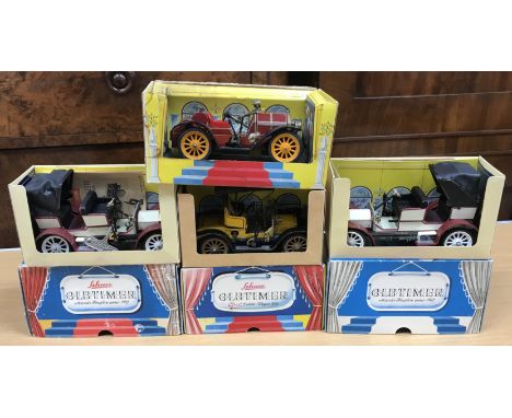 A collection of four Schuco Old Timer model vintage cars including a Mercedes Simplex 1902 (1229) (x 2), an Opal Doktor-Wagen