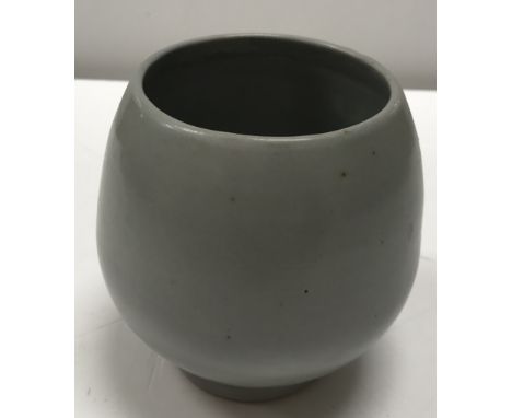 A Charles Vyse of Chelsea studio pottery vase in plain matt grey glaze, with terracotta band towards the base of the circular