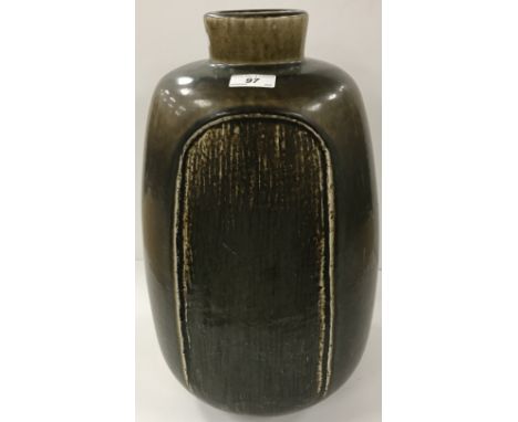 A Danish Saxbo pottery vase with melon type glaze and bark style panel decoration marked to base with yin and yang mark and "