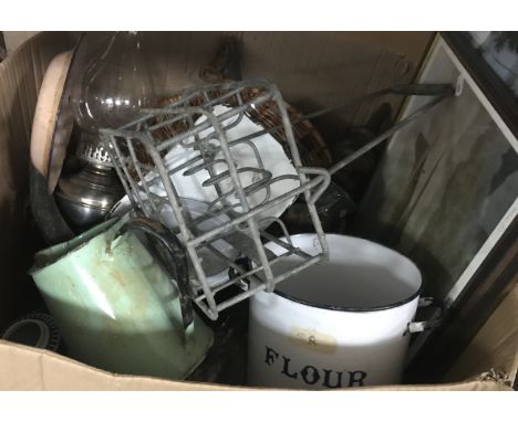 A box of assorted kitchenalia, etc. to include an enamelled flour bin, enamelled jug, various horse hanes, etc., together wit