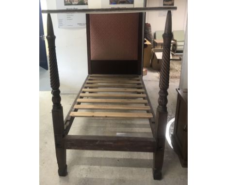 A 19th Century mahogany full tester bedstead with fabric covered canopy and upholstered headboard, the end posts of rope-twis