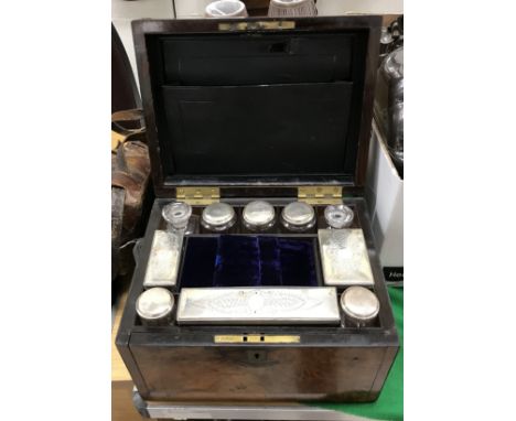 A Victorian burr walnut vanity case and jewellery casket inscribed "Forgie Maker Glasgow", the upper section containing vario