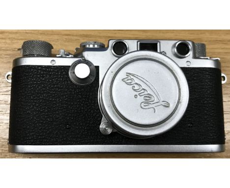 A Leica DRP Ernst Leitz Wettzlar 35 mm camera, Serial No. 589491, with Summitar F=5cm 1:2 lens, No. 679234, together with ori