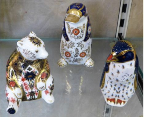 Royal Crown Derby paperweights, bear, penguin and duck billed platypus, all gold stoppers (3)