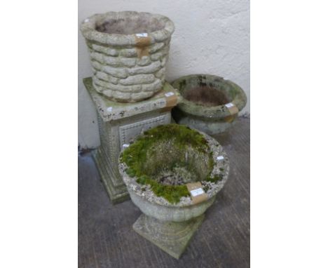 A concrete planter on plinth together with a pair of garden urns (4)
