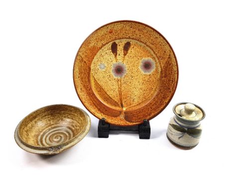 DAVID LLOYD JONES (1928-1994); a stoneware dinner plate, impressed LJ mark, diameter 29cm, an Andrew Hague jar and cover and 