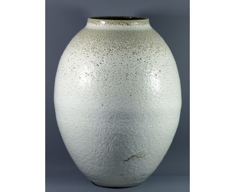 ALBERT MONTSERRAT (born 1980); a large porcelain vessel covered in white and light brown glaze with oil spot details to rim a