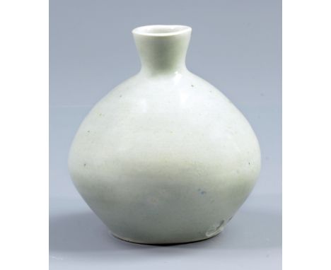 BERNARD LEACH (1887-1979) for Leach Pottery; a porcelain bud vase covered in pale celadon glaze, impressed BL and pottery mar