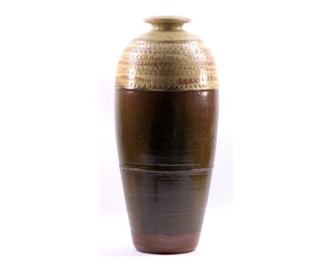 RICHARD BATTERHAM (born 1936); a tall stoneware bottle with green ash glaze to neck and shoulder, height 59.5cm. (D)   CONDIT