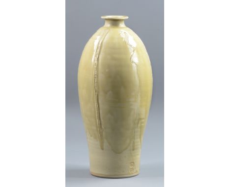 JIM MALONE (born 1946); a stoneware vase covered in green celadon glaze with incised decoration, impressed JM and A for Ainst