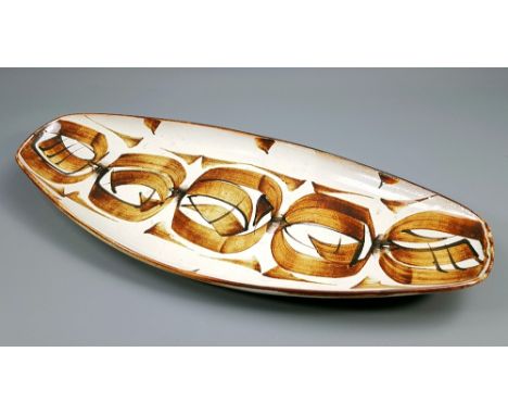 ALAN CAIGER-SMITH (born 1930) for Aldermaston Pottery; an elongated tin-glazed earthenware tray, painted mark, pottery stamp 