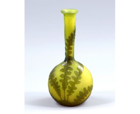 GALLÉ; an early 20th century acid etched cameo glass vase decorated with ferns on a green ground, signed, also bearing Emile 