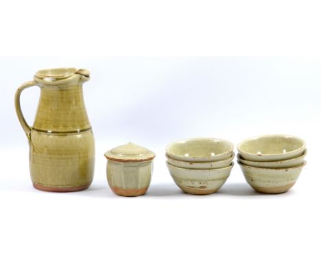 RICHARD BATTERHAM (born 1936); a stoneware jug, small caddy and six cereal bowls, jug height 23.5cm (8). (D)   CONDITION REPO