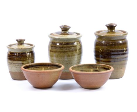 ROGER COCKRAM (born 1947); three stoneware caddies and two bowls, impressed RJC marks, tallest height 19.5cm (5). (D)   CONDI
