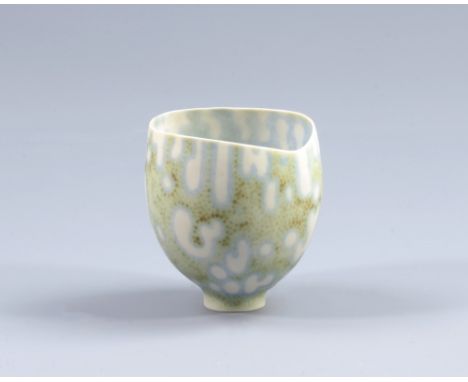 MARY ROGERS (born 1929); a small porcelain footed vase, abstract pattern on stippled ground, incised MER mark, height 8cm. CO