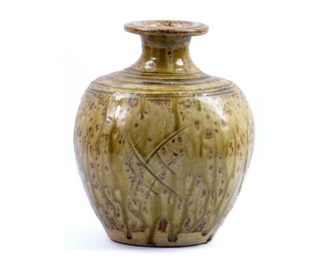 JIM MALONE (born 1946); a stoneware bottle with flattened sides covered in green ash glaze, impressed JM mark, height 23cm. (