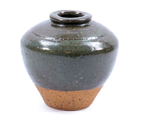 BERNARD LEACH (1887-1979) for Leach Pottery; a stoneware collared vase partially covered in dark green glaze with iron spots,