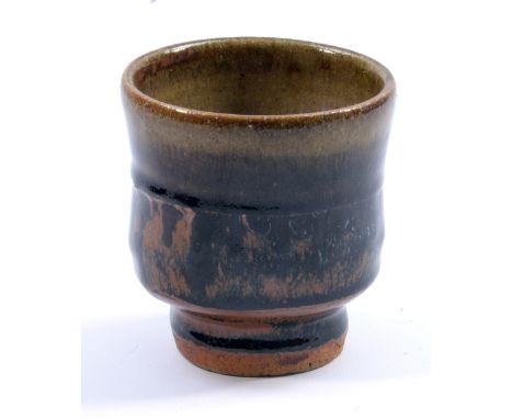 JIM MALONE (born 1946); a stoneware yunomi, tenmoku breaking to kaki glaze to exterior, green ash pooling to white glaze to i