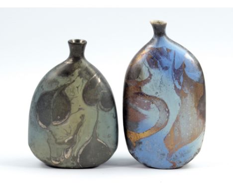 ANNE JAMES (born 1937); two flattened raku bottles, metallic blue and gold/green and silver decoration, incised AJ marks, tal