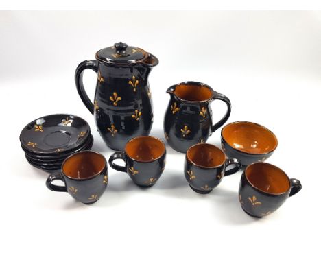 WILLIAM FISHLEY HOLLAND (1889-1969); an earthenware coffee set covered in glossy brown glaze with ochre decoration, comprisin