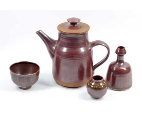 DAVID LLOYD JONES (1928-1994); a stoneware coffee pot covered in rust red glaze, impressed mark, height 22cm, and three porce