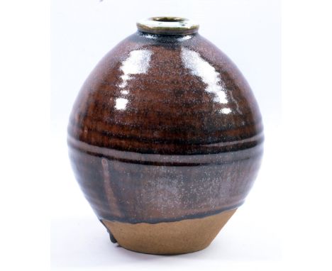 DAVID LEACH (1911-2005) for Lowerdown Pottery; a bulbous stoneware vase covered in running tenmoku breaking to kaki glaze, im