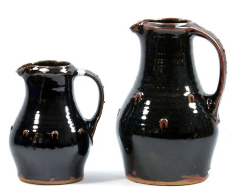 JIM MALONE (born 1946); a stoneware jug covered in tenmoku glaze, impressed JM and L for Lessonhall marks, height 27cm, and a