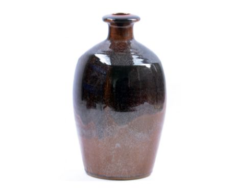DAVID LEACH (1911-2005) for Lowerdown Pottery; a square stoneware bottle covered in tenmoku breaking to kaki glaze, impressed