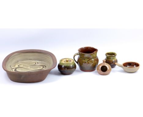 SID TUSTIN (1914-2005) for Winchcombe Pottery; a slipware jug and stoneware ramekin, impressed ST and pottery marks, jug heig