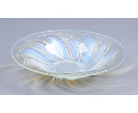 LALIQUE; a clear and opaque glass shallow bowl with wrythen moulded stylised leaf decoration, etched mark 'R Lalique, France'