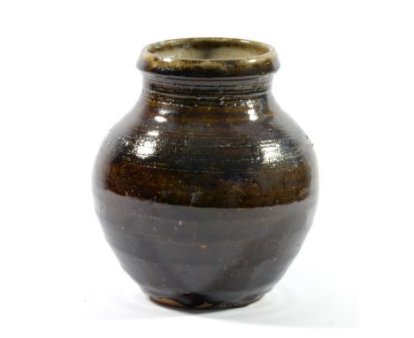 Leach Pottery; a stoneware vase covered in treacle glaze, probably by Sylvia Hardaker, impressed SH and pottery marks, made c