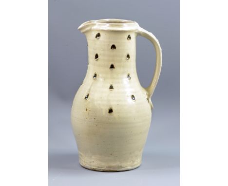 JIM MALONE (born 1946); a stoneware jug covered in cream glaze with iron decoration, impressed JM and A for Ainstable marks, 