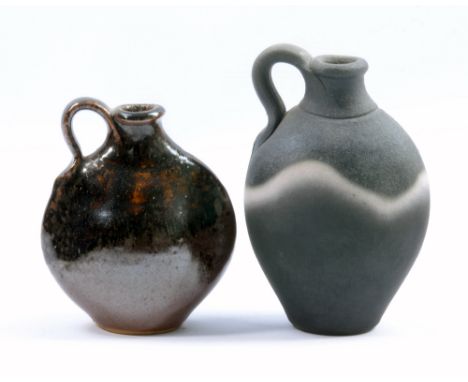 JOHN LEACH (born 1939) for Muchelney Pottery; a stoneware 'black mood' flask and a smaller flask, impressed JHL and pottery m