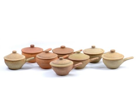 Leach Pottery; a set of eight stoneware covered soups, impressed pottery marks, diameter (including handles) 19cm (8). CONDIT