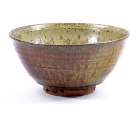 JIM MALONE (born 1946); a stoneware footed bowl covered in green ash glaze, impressed JM and L for Lessonhall marks, diameter