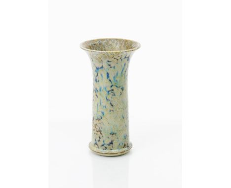 A Ruskin Pottery high-fired stoneware vase by William Howson Taylor, dated 1928, cylindrical form with flaring rim, covered i