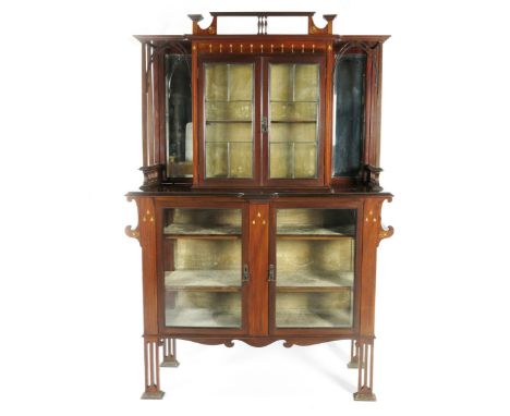 An English Art Nouveau mahogany display cabinet possibly by Shapland and Petter,  central glazed velvet lined cabinet, over g