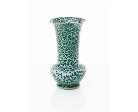 A Ruskin Pottery high-fired vase by William Howson Taylor,  compressed form with tall flaring neck, covered in a mottled mint