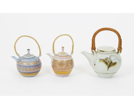 Mary Rich (born 1940) a porcelain teapot and cover, banded in blue and purple with gilt decoration with wicker handle, anothe