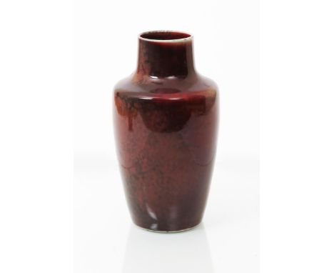 A Ruskin Pottery high-fired stoneware vase by William Howson Taylor, dated 1923,  covered in a red flambe glaze with Dove Gre