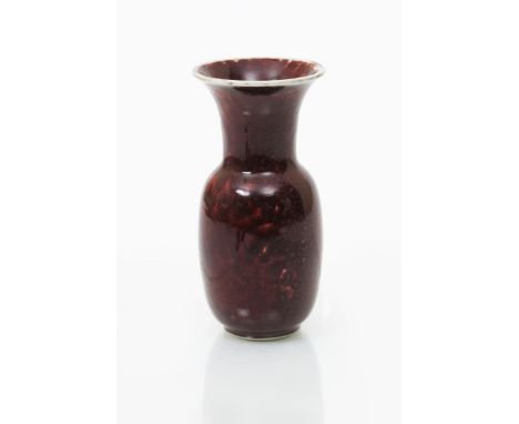 A Ruskin Pottery high-fired stoneware vase by William Howson Taylor, dated 1920, shouldered form with flaring neck, covered i