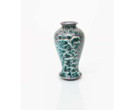 A Ruskin Pottery high-fired stoneware small baluster vase by William Howson Taylor, dated 1905, purple glaze covered in a fis