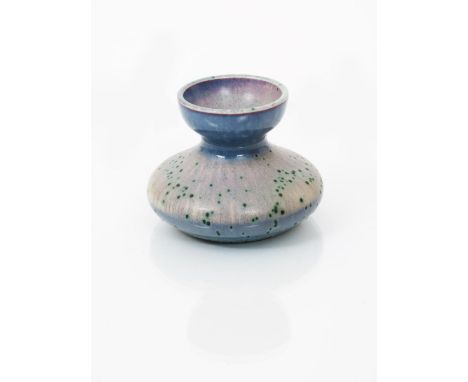 A Ruskin Pottery high-fired stoneware vase by William Howson Taylor, compressed form with everted neck, streaked lavender gla