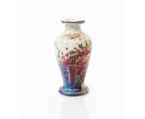 A Ruskin Pottery high-fired stoneware vase by William Howson Taylor, dated 1908, baluster form covered in an off white glaze 