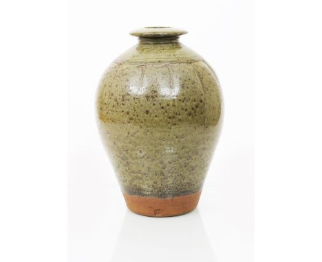 •Phil Rogers (born 1951) a large stoneware bottle vase, with carved flutes to shoulder, covered to the foot with a speckled a